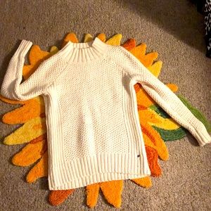 White, cable knit turtleneck